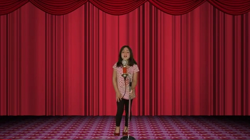 Singing On Stage Girl is singing on stage